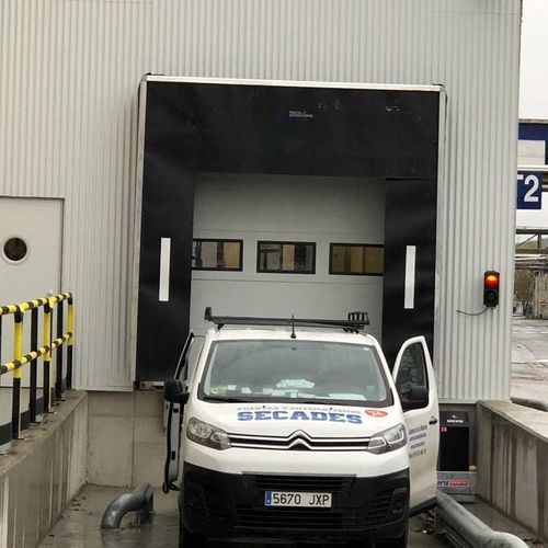 Calce para muelle de carga - PUERTAS SECADES - para camión / metálico