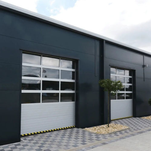 Puerta seccional - KAPISAN ENDÜSTRİYEL KAPI SİSTEMLERİ - de aluminio / de acero / para interior