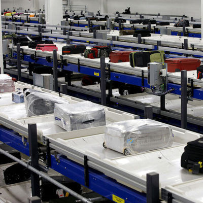 Sistema de manipulación de maletas - CrisBag® - BEUMER Group GmbH & Co.KG - enteramente automático / de alta velocidad / modulable