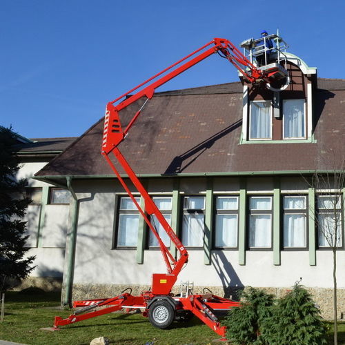 Cesta articulada de tracción - Europelift TM13G - Rothlehner Arbeitsbühnen GmbH - con ruedas / electrohidráulica / para uso en interiores y exteriores