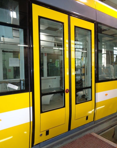 Puerta de tren corredera - ŽOS 4 TRAINS - eléctrica / para tranvías / de entrada