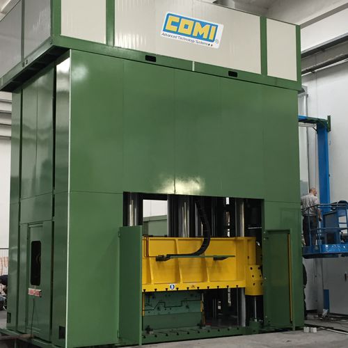Prensa de compresión - COMI GROUP - hidráulica / para materiales compuestos / de bastidor