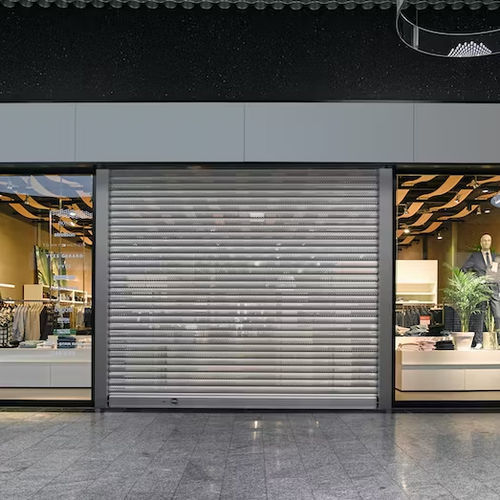 Puerta enrollable - Hörmann - seccional / de acero inoxidable / de aluminio