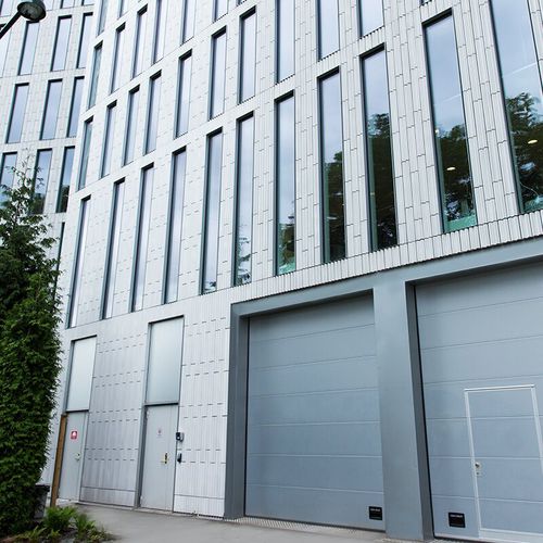 Puerta seccional - OH1042P - ASSA ABLOY Entrance Systems - peatonal / de acero inoxidable / de aluminio