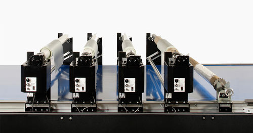 Enrollador-desenrollador de tejidos - Eastman Machine Company - automático / de rodillos