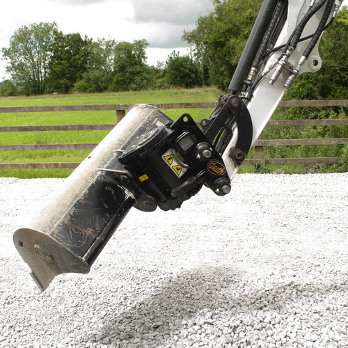 Sistema de acoplamiento rápido para manipulador de materiales - Geith International Ltd. - para excavadora