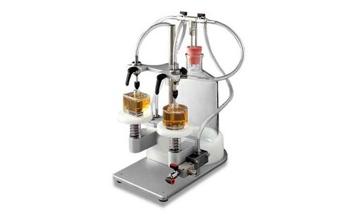 Llenadora semiautomática - VACUFILL - Omas Tecnosistemi S.p.a. - multicontenedor / para líquido / para perfumes