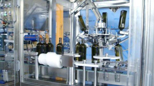 Llenadora taponadora de para aceite de oliva - MFC - PMR System Group - de pinza / para botellas / automática
