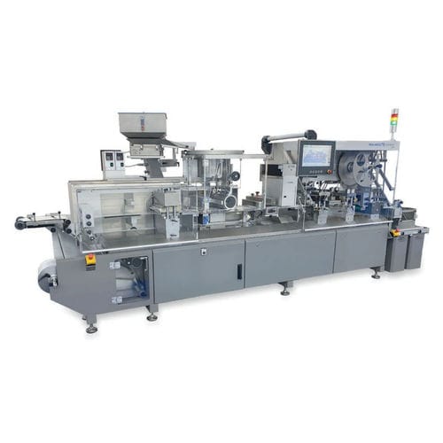 Máquina de embalaje automática - N 623 - Romaco Group - en blíster / de comprimidos / de jeringas