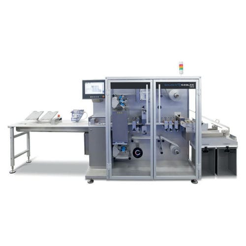 Máquina de embalaje automática - HM 2 series - Romaco Group - continua / de jeringas / para la industria farmacéutica