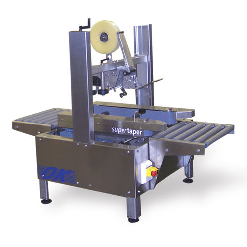 Precintadora de cajas de cartón semiautomática - Supertaper 1M - OK International - de doble solapa / cinta adhesiva