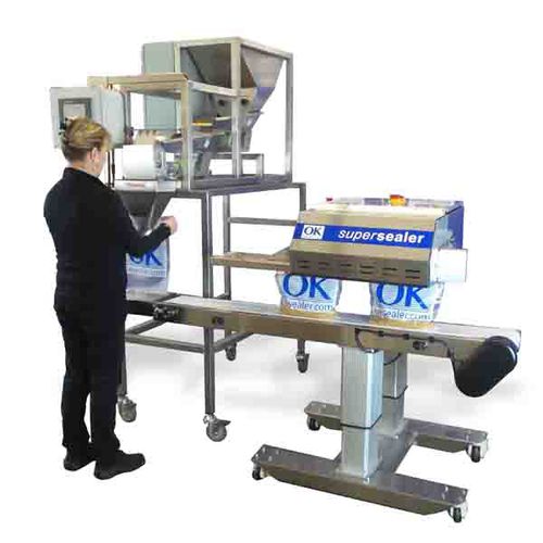 Llenadora selladora semiautomática - Supersealer SB20 WS - OK International - lineal / para productos alimentarios / para la industria alimentaria