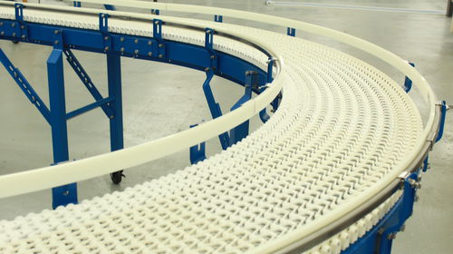 Transportador con cadena - SpanTech - curvo / para cajas de cartón / para la industria alimentaria