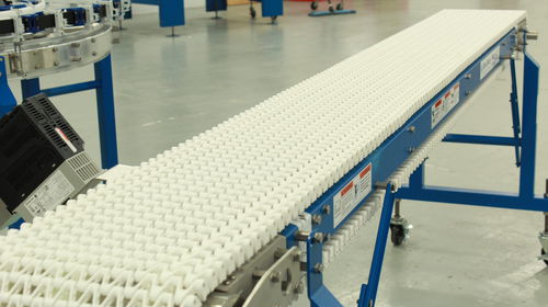 Transportador con cadena - SpanTech - recto / para cajas de cartón / para la industria alimentaria