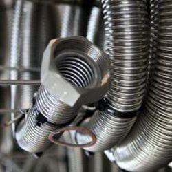 Manguera para aceite - KLINGER - de metal / de calor / flexible