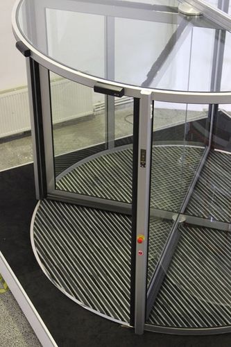 Puerta automática - 04 - FAAC SpA - giratoria / acristalados / para interior