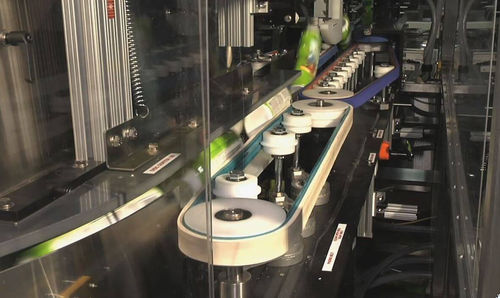 Posicionador de contenedores rotativo - Cozzoli Machine Company - industrial