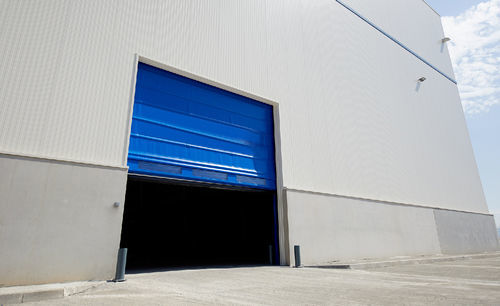 Puerta apilable - PUERTAS FERROFLEX SL - de acero / de acero inoxidable / de tejido