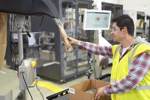 Sistema de llenado automatizado - Automated Packaging Systems - de cajas / para papel / en línea