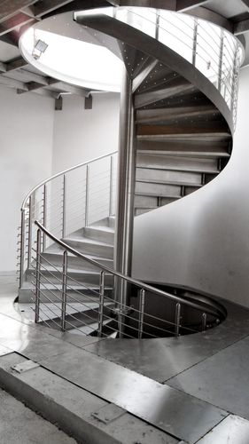 Escalera fija de caracol - VLS Technologies - de acero inoxidable / con barrotes / modular