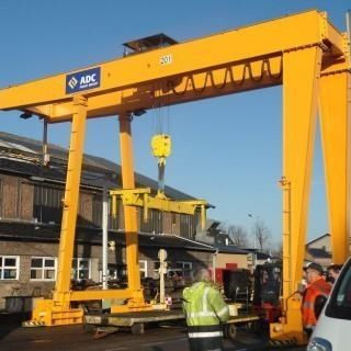 Pórtico en riel - ADC - para aplicaciones marinas / para obra de elementos prefabricados / de descarga de buque