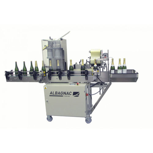 Etiquetadora con sistema de capsulado - CÉRÈS VIN EFFERVESCENT - Albagnac - automática / para botellas de champán / para aplicación en el lateral del producto