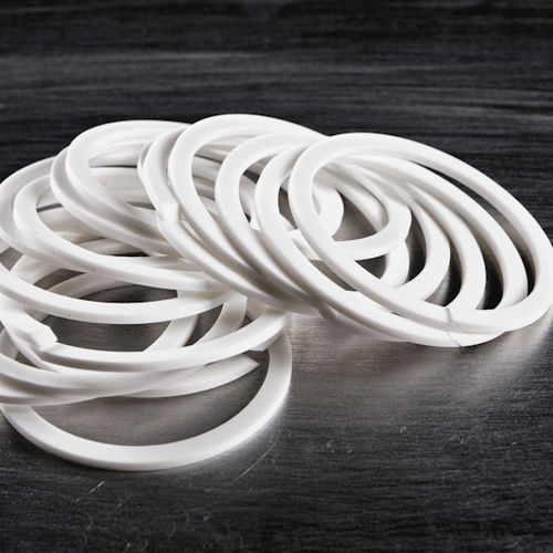 Junta de botón - PTFE Competence Center GmbH - espiralada / de PTFE / circular