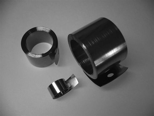 Muelle de tracción constante - Barnes Group - espiral / de fleje / de acero inoxidable