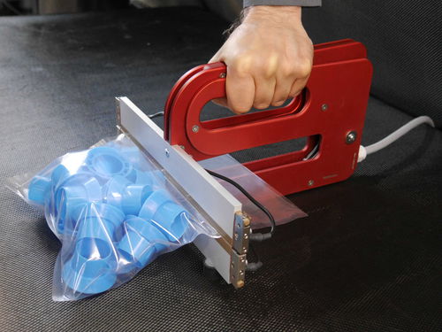Termoselladora de mano - TOSS GmbH & Co. KG - para cierre de bolsas / de impulso
