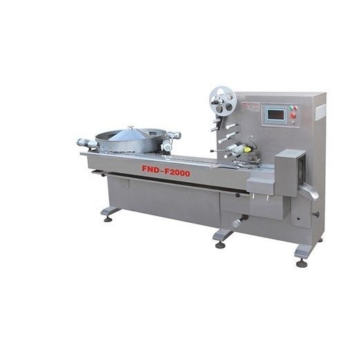 Máquina de embalaje controlada por PLC - FND-F2000 - Taizhou Funengda Industry Co., Ltd. - servoaccionada / horizontal / tipo almohada