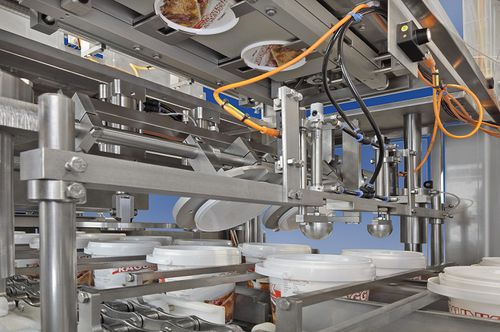 Colocadora de tapadera automática - Robot Food Technologies Germany GmbH