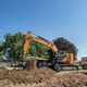 excavadora intermedia / con orugas / diésel / para obra de construcción