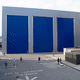 puerta apilable / de acero galvanizado / de PVC / industrial